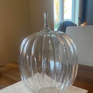 Large clear glass pumpkin.